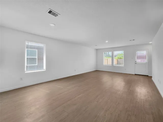 an empty room with windows