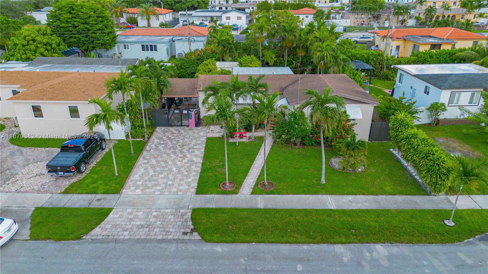 8341 Southwest 27th Lane Miami, FL 33155 - Photo 1 of 20 a view of backyard with swimming pool and lawn chairs
