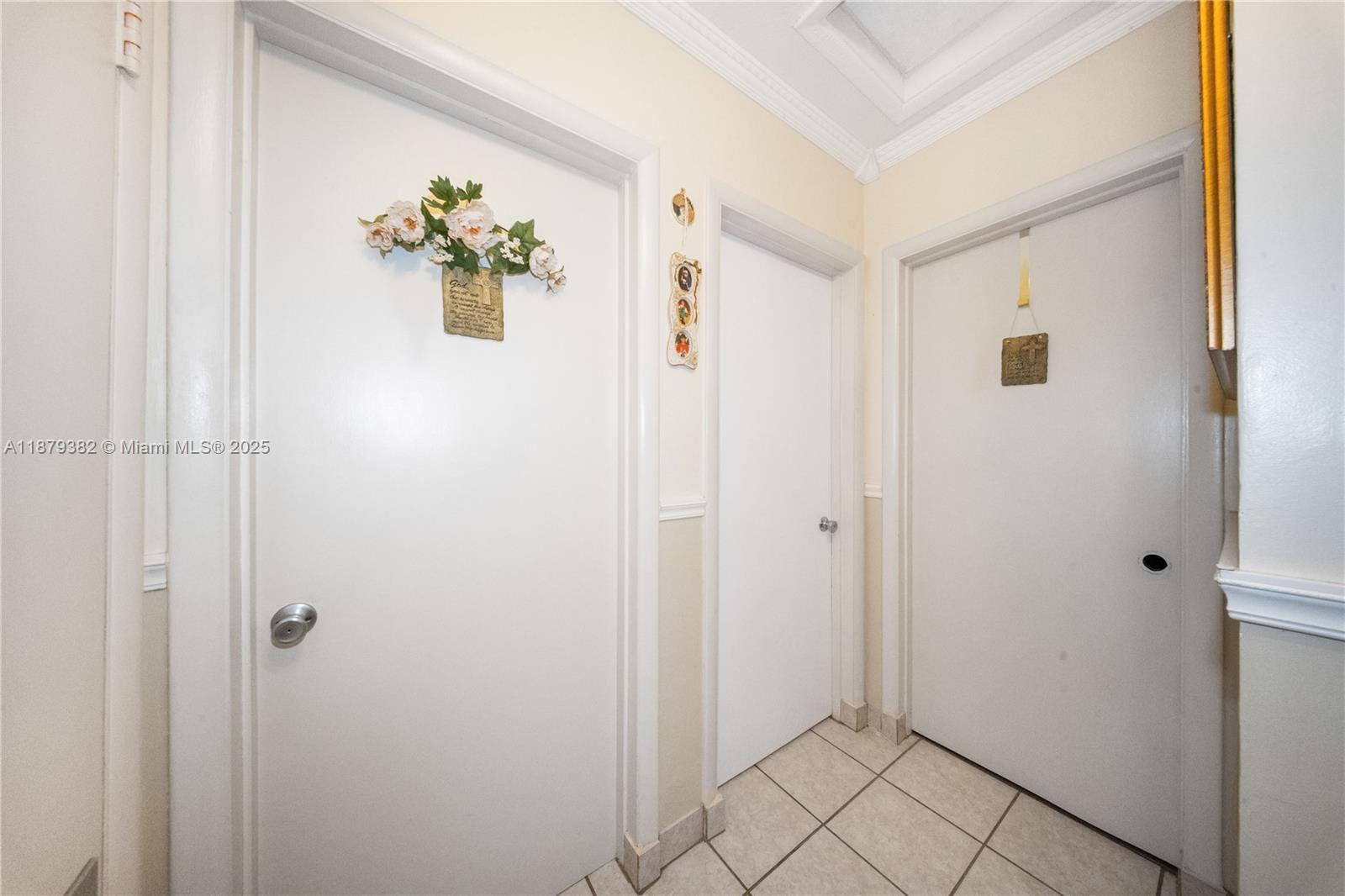 8341 Southwest 27th Lane Miami, FL 33155 - Photo 12 of 20 a view of an entryway with wooden floor