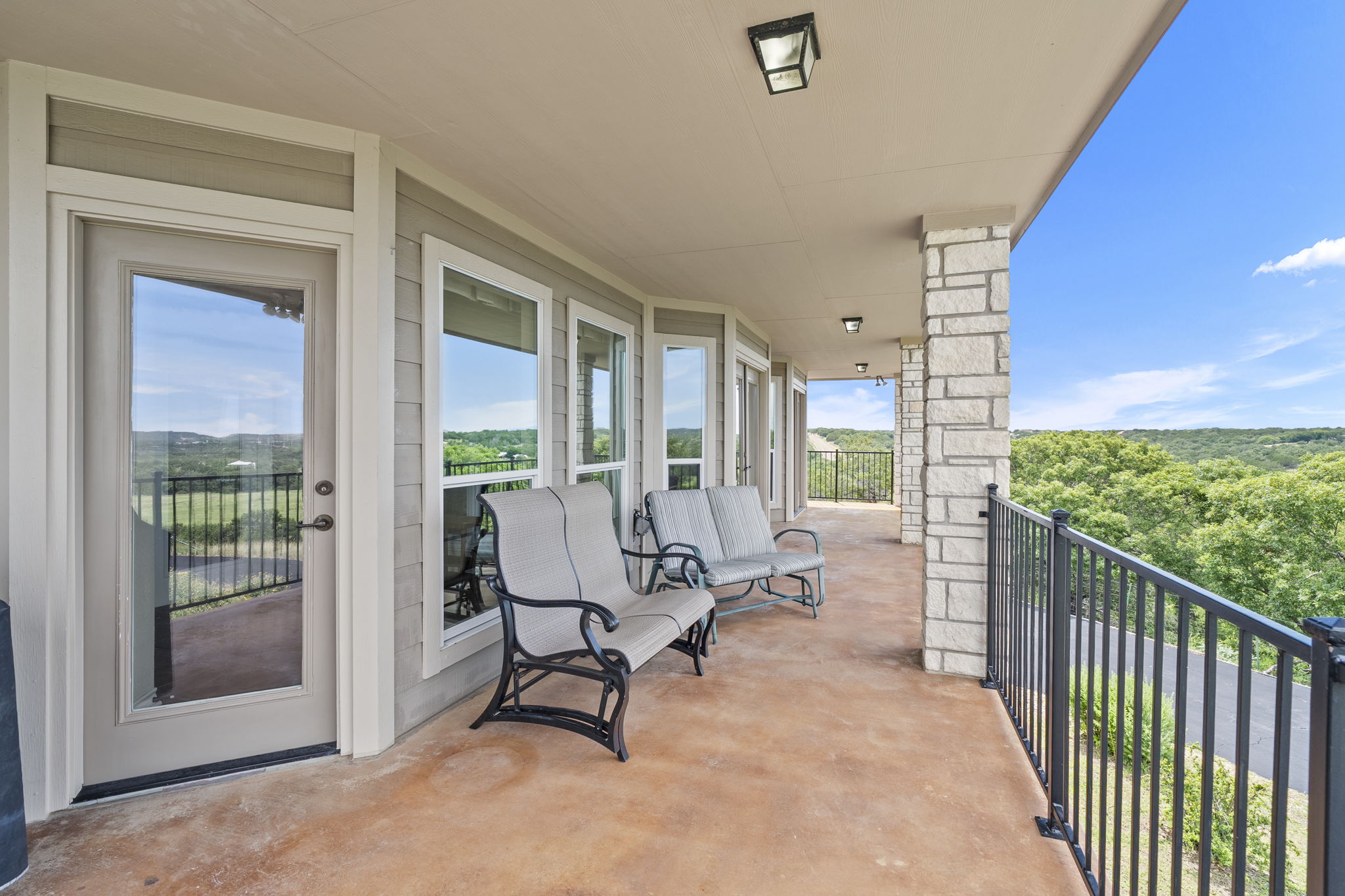 1427 River Ridge Ranch Road Killeen, TX 76549 - Photo 13 of 40 Experience elevated outdoor living on this expansive covered patio, offering panoramic views of nature.