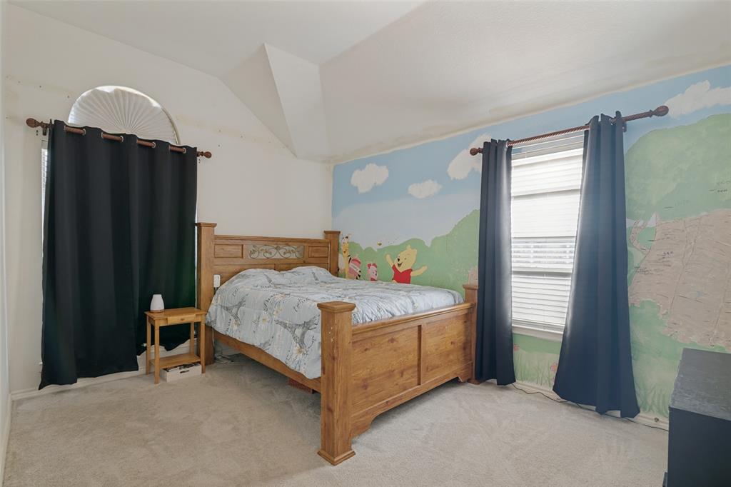 2213 Ranch Road Sachse, TX 75048 - Photo 17 of 28 Vaulted ceiling with an arched window and a rectangular window