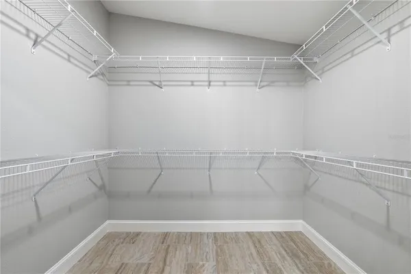 a view of a room with racks on the wall