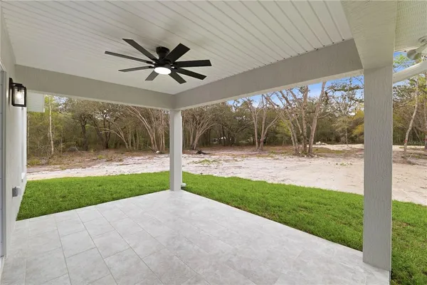 a view of a porch with a backyard