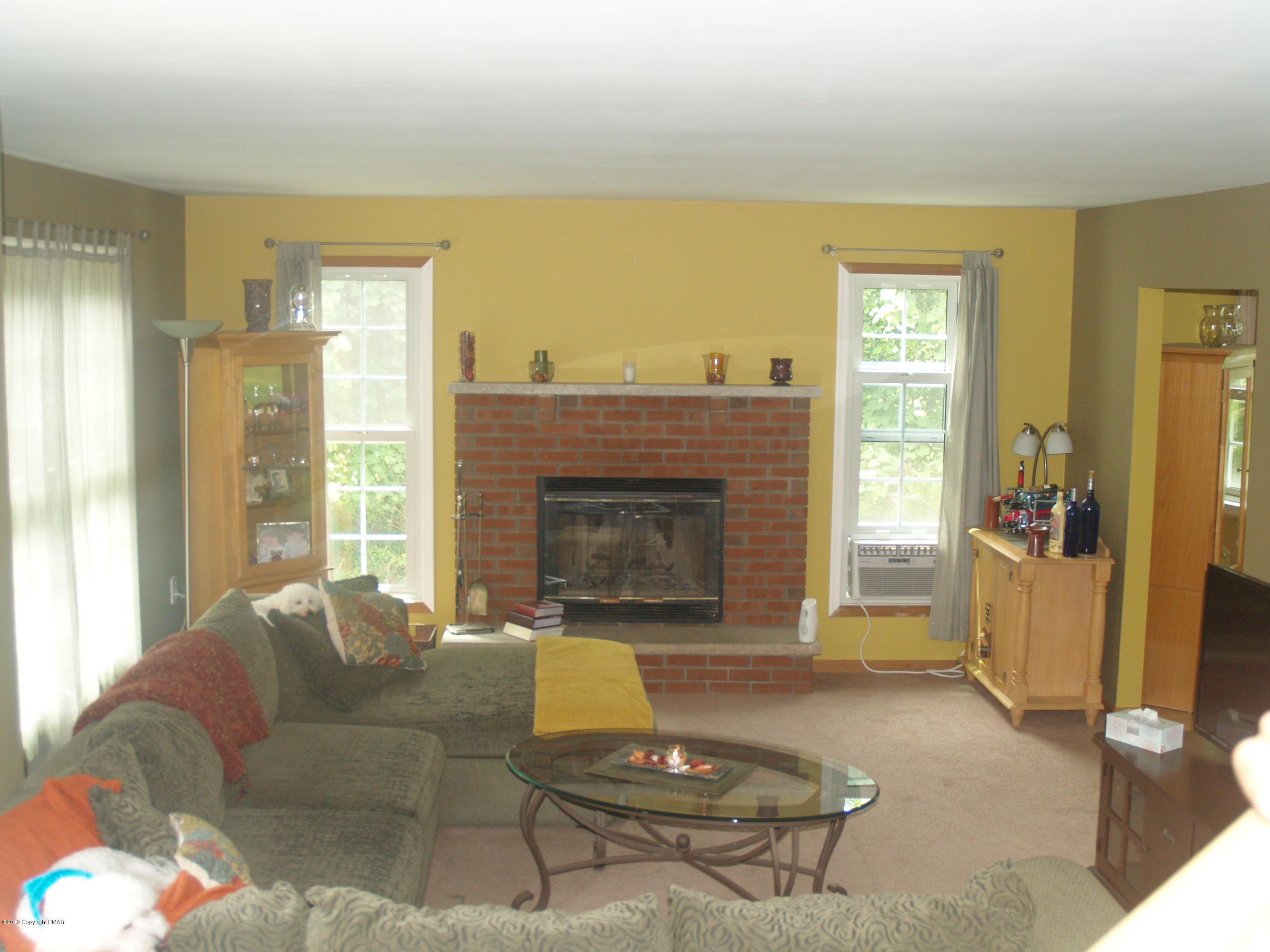 17 Dancing Ridge Road East Stroudsburg, PA 18302 - Photo 11 of 44 a living room with furniture and a fireplace