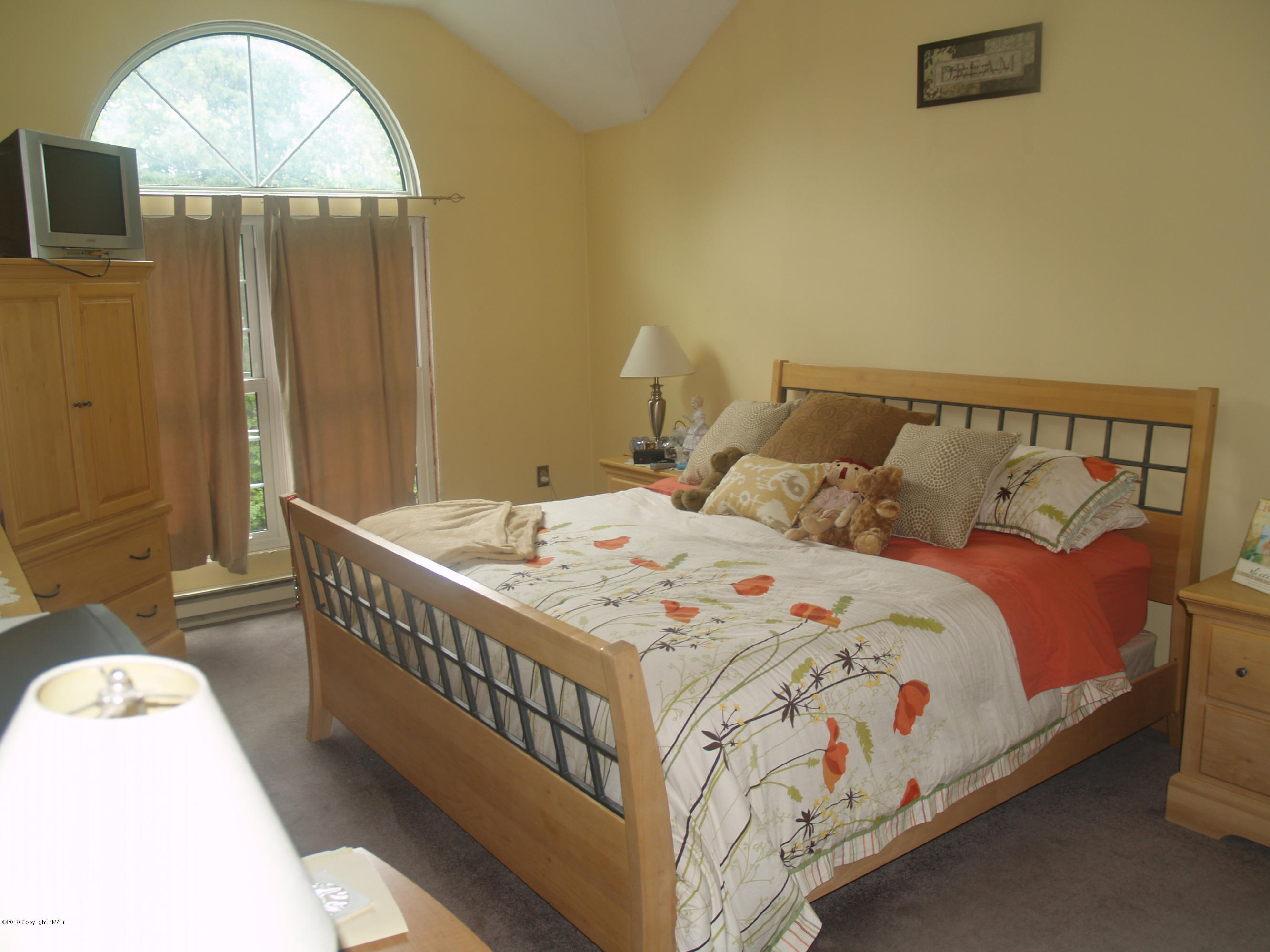 17 Dancing Ridge Road East Stroudsburg, PA 18302 - Photo 12 of 44 a bedroom with a bed and a window