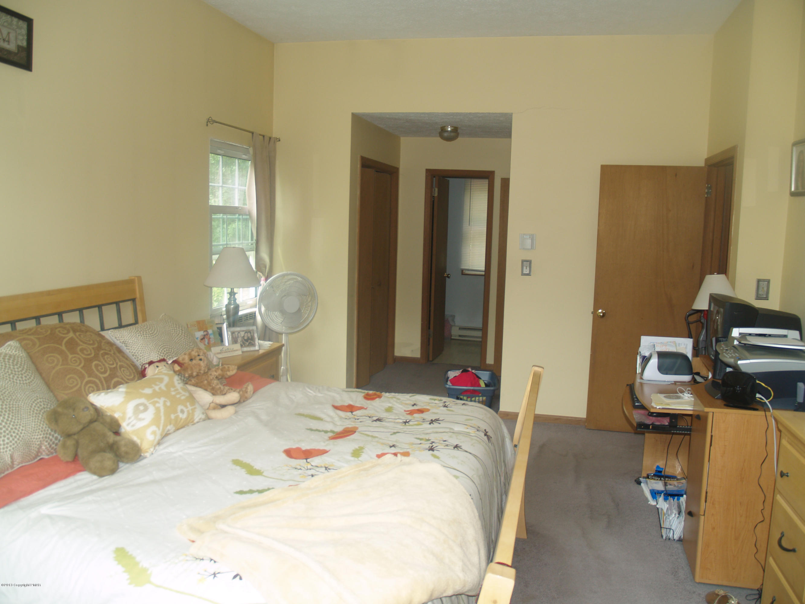 17 Dancing Ridge Road East Stroudsburg, PA 18302 - Photo 14 of 44 a bed sitting in a bedroom and chair