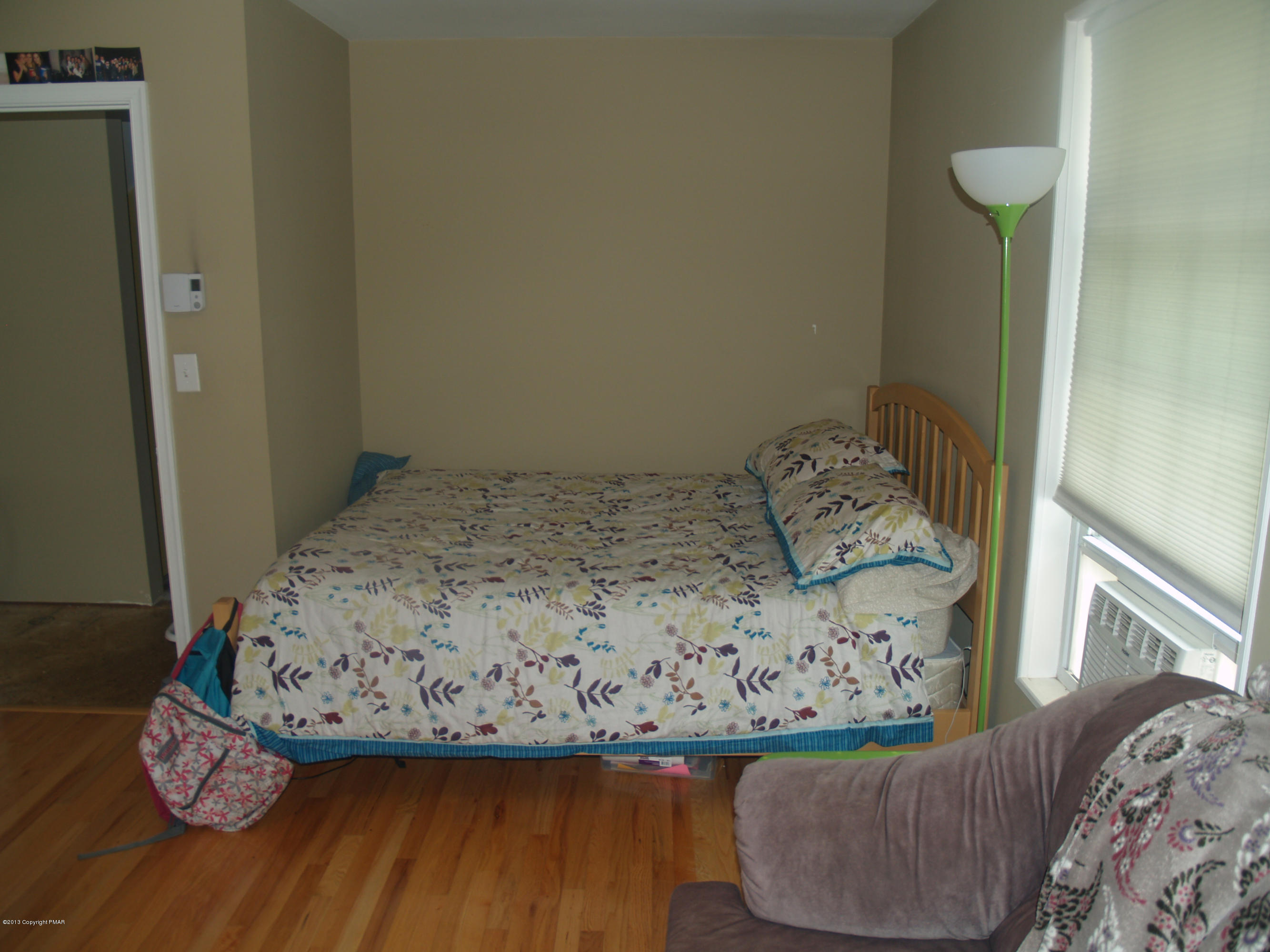 17 Dancing Ridge Road East Stroudsburg, PA 18302 - Photo 21 of 44 a bed sitting in a bedroom next to a wooden floor