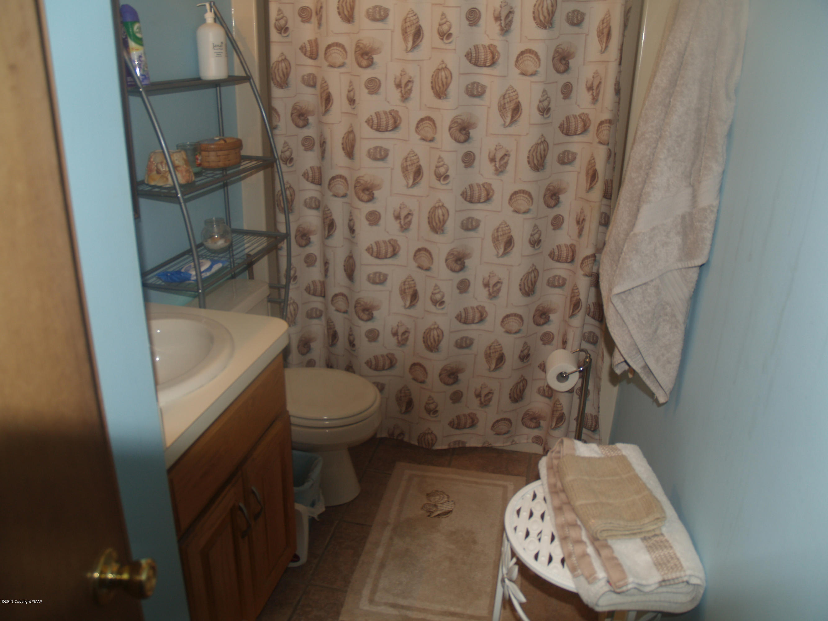 17 Dancing Ridge Road East Stroudsburg, PA 18302 - Photo 26 of 44 a bathroom with a toilet and a shower curtain