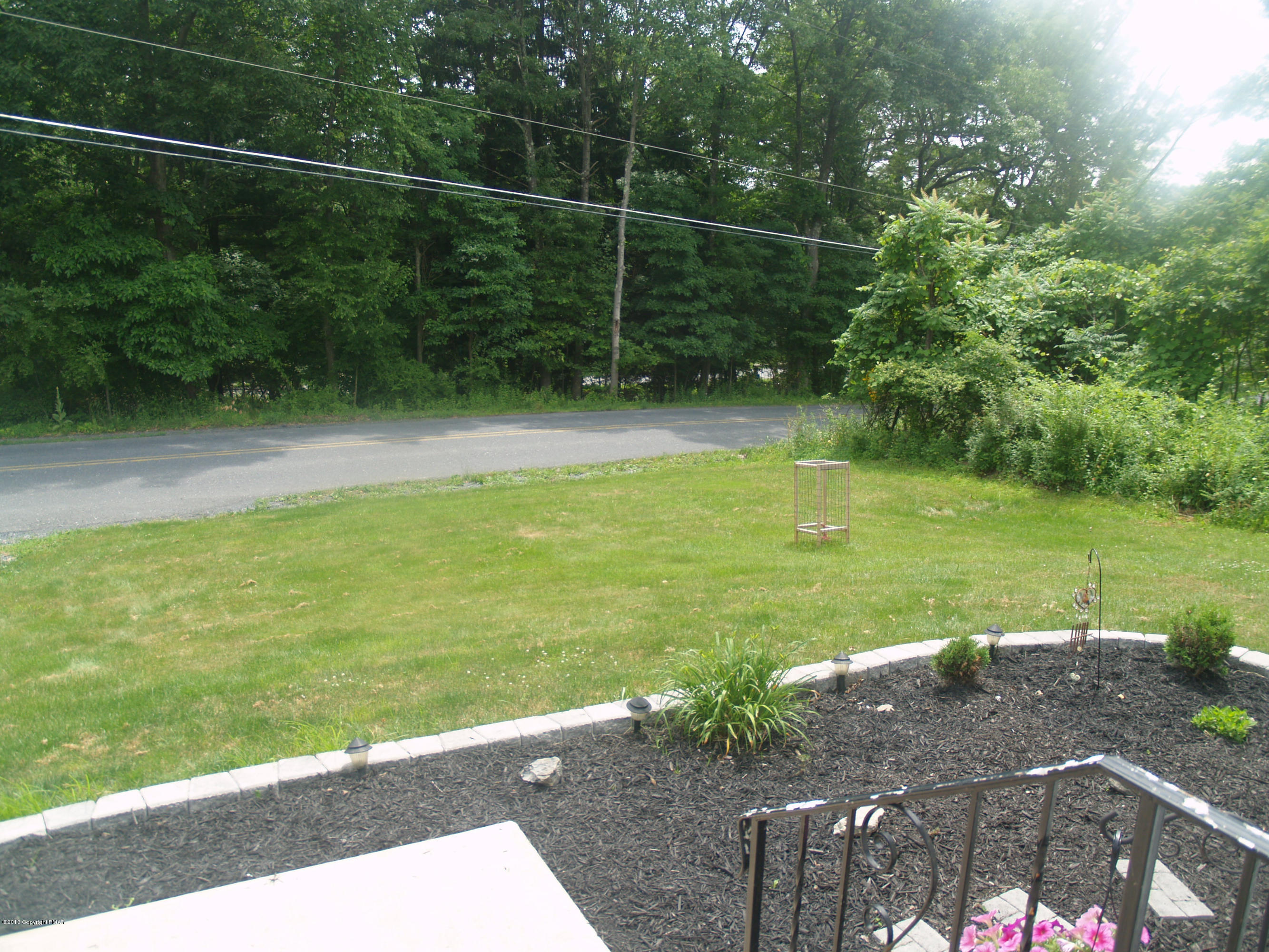 17 Dancing Ridge Road East Stroudsburg, PA 18302 - Photo 3 of 44 a view of a river and garden with wooden fence