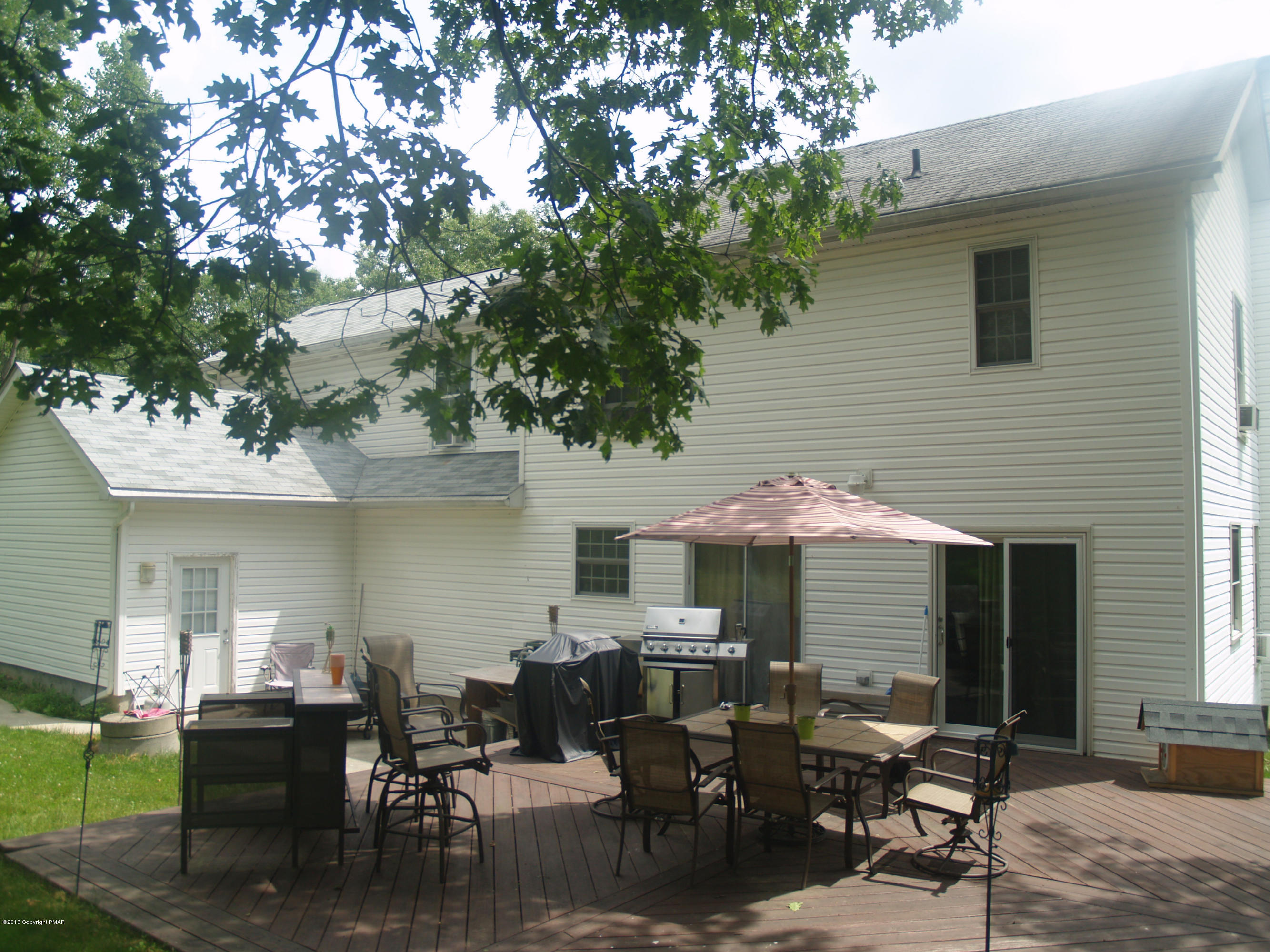 17 Dancing Ridge Road East Stroudsburg, PA 18302 - Photo 39 of 44 a patio with table and chairs