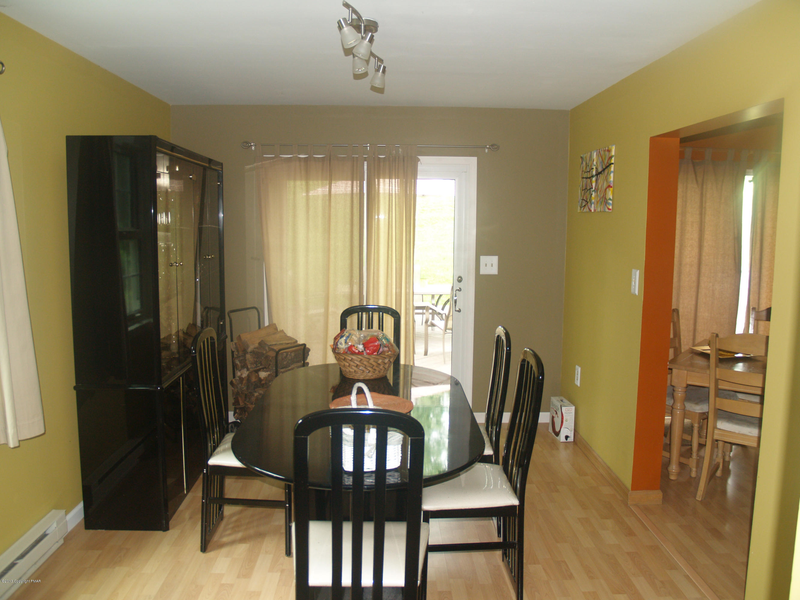 17 Dancing Ridge Road East Stroudsburg, PA 18302 - Photo 8 of 44 a view of a a dining room with furniture window and wooden floor