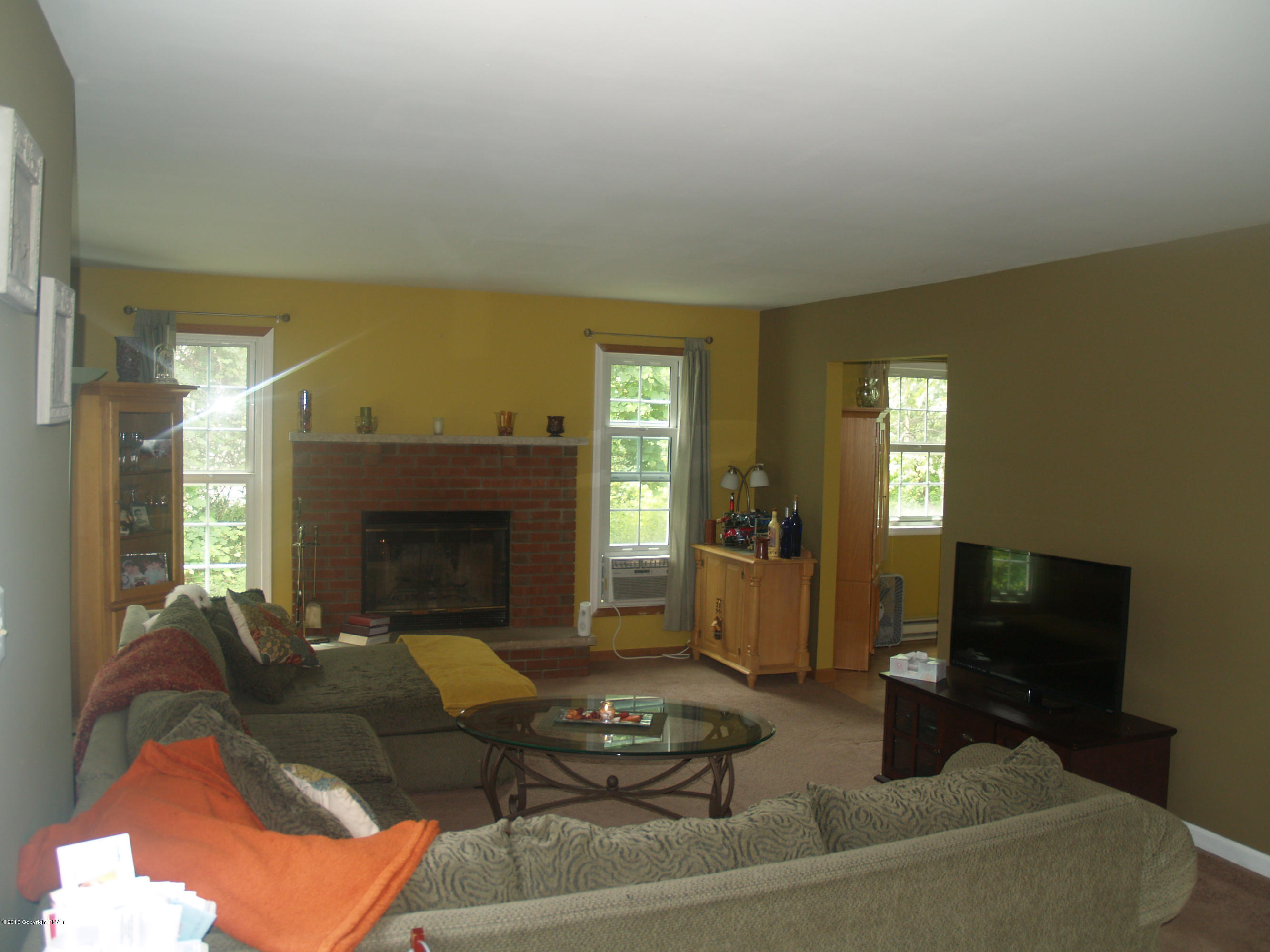 17 Dancing Ridge Road East Stroudsburg, PA 18302 - Photo 10 of 44 a living room with furniture and a fireplace