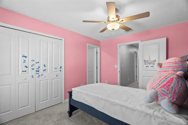 a view of storage and utility room with washer and dryer