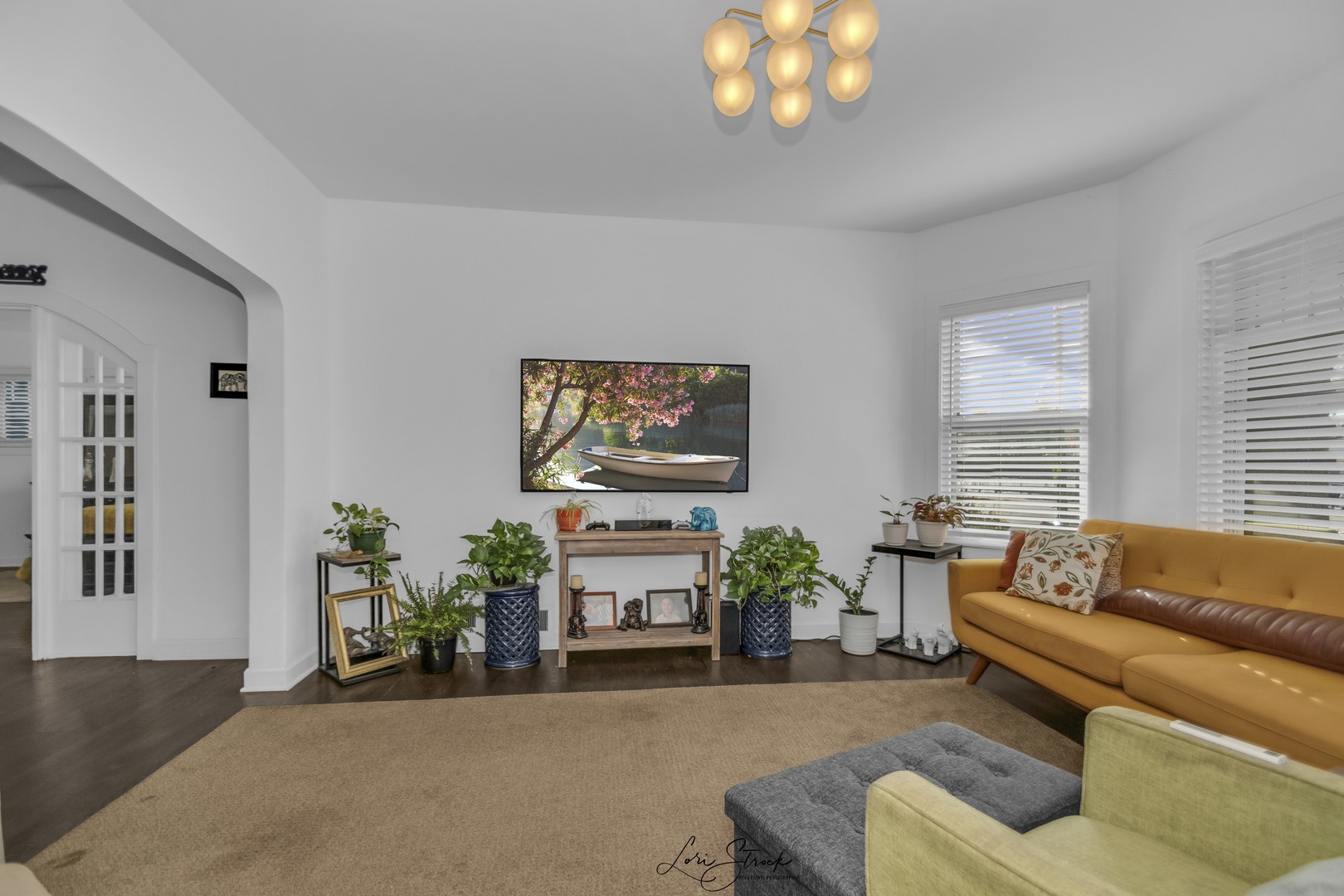 3637 North Pulaski Road Chicago, IL 60641 - Photo 3 of 34 a living room with furniture and a flat screen tv