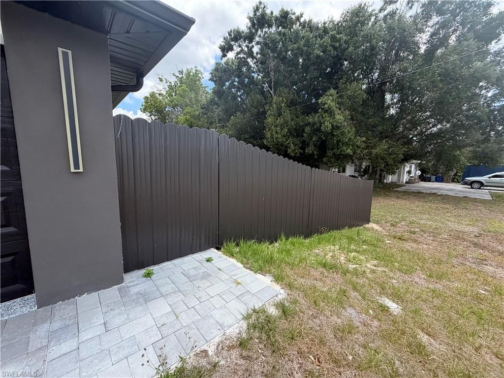 15 Louisiana Road Lehigh Acres, FL 33936 - Photo 6 of 22 a backyard of a house