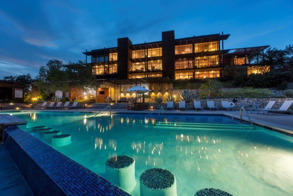 1101 Ivean Pearson Road, Unit B103 Lago Vista, TX 78645 - Photo 2 of 39 a view of swimming pool having outdoor seating