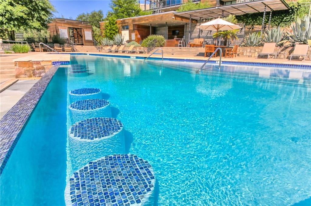 1101 Ivean Pearson Road, Unit B103 Lago Vista, TX 78645 - Photo 3 of 39 swimming pool view with a outdoor seating