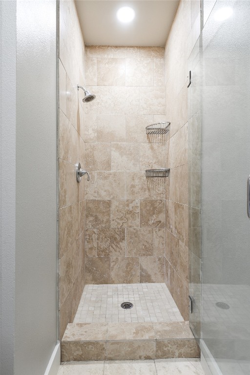 1101 Ivean Pearson Road, Unit B103 Lago Vista, TX 78645 - Photo 30 of 39 a bathroom with a shower