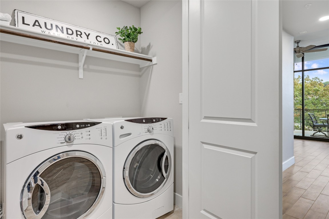 1101 Ivean Pearson Road, Unit B103 Lago Vista, TX 78645 - Photo 33 of 39 a utility room with dryer and washer