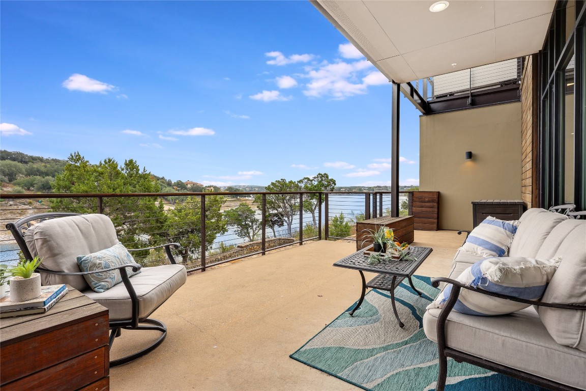 1101 Ivean Pearson Road, Unit B103 Lago Vista, TX 78645 - Photo 35 of 39 a building outdoor space with patio furniture
