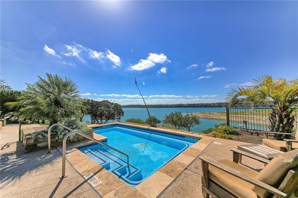 1101 Ivean Pearson Road, Unit B103 Lago Vista, TX 78645 - Photo 7 of 39 a view of a patio with swimming pool