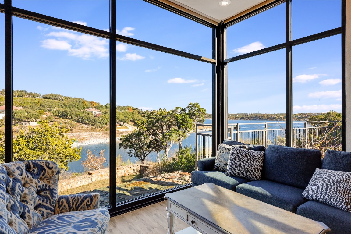 1101 Ivean Pearson Road, Unit B103 Lago Vista, TX 78645 - Photo 10 of 39 a living room with large windows