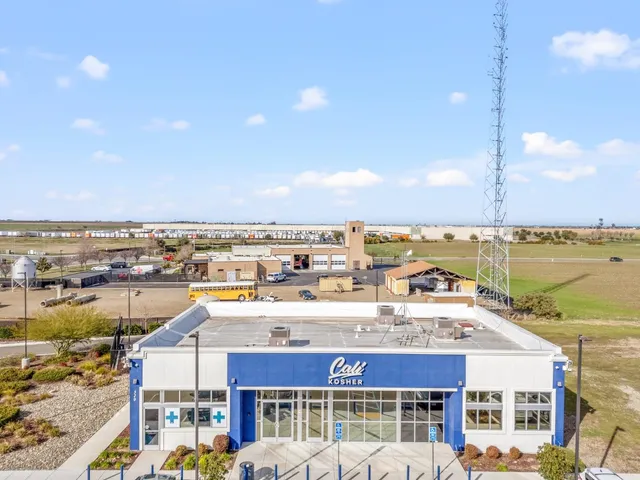 a view of city with ocean
