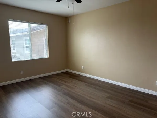 a spacious bathroom with a toilet sink and shower