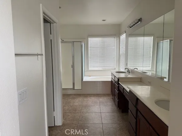 a hallway with wooden floor