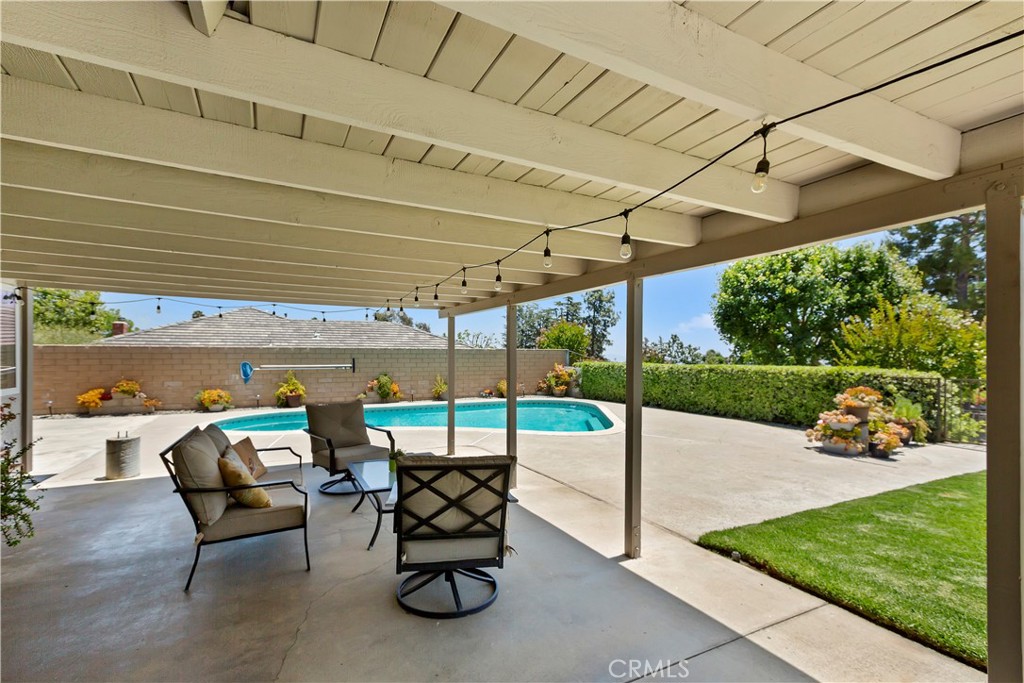 8527 Hillside Road Rancho Cucamonga, CA 91701 - Photo 30 of 50 a building outdoor space with seating