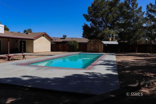 205 Kimberly Lane Ridgecrest, CA 93555 - Photo 35 of 39 a view of a house with a yard