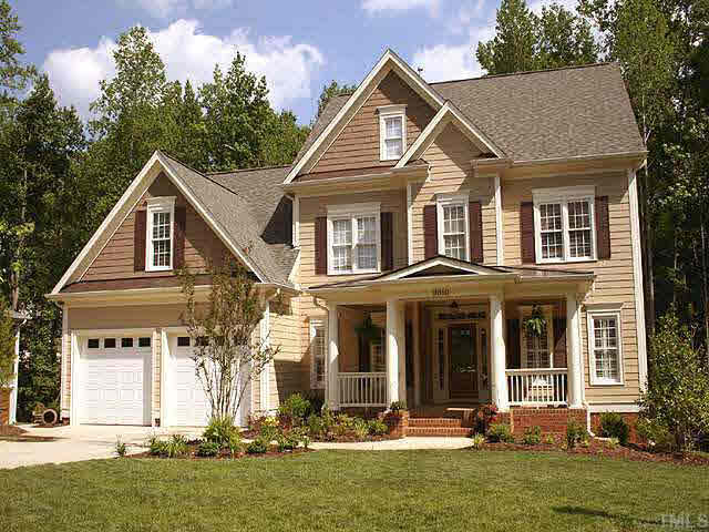 8810 Fidelis Lane Raleigh, NC 27613 - Photo 1 of 10 a front view of a house with a yard