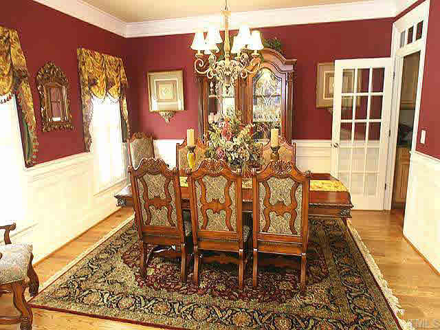 8810 Fidelis Lane Raleigh, NC 27613 - Photo 3 of 10 a dining room with furniture and window