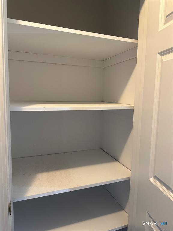 86 Buff Cap Road, Unit A4 Tolland, CT 06084 - Photo 16 of 21 Linen closet in hallway