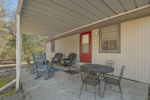 a view of a yard with a outdoor space
