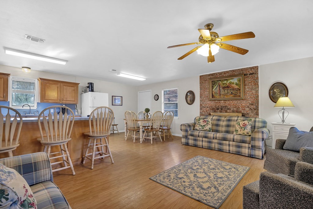 893 Capps Road Huntington, TX 75949 - Photo 2 of 32 a living room with furniture and wooden floor