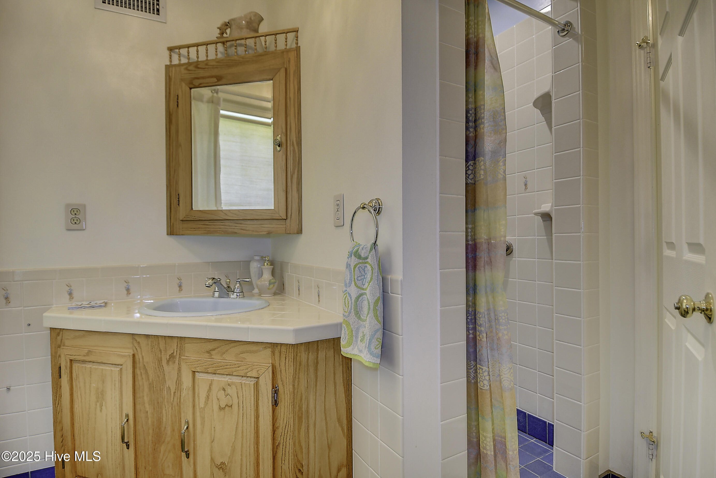 1436 Waterlily Road Coinjock, NC 27923 - Photo 35 of 65 35-Hall-Bathroom