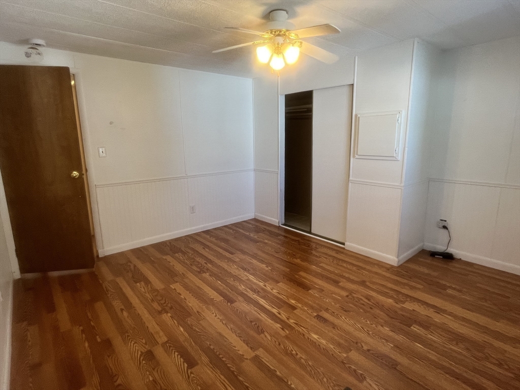 4 Joseph Street Wareham, MA 02538 - Photo 14 of 23 a view of empty room with wooden floor