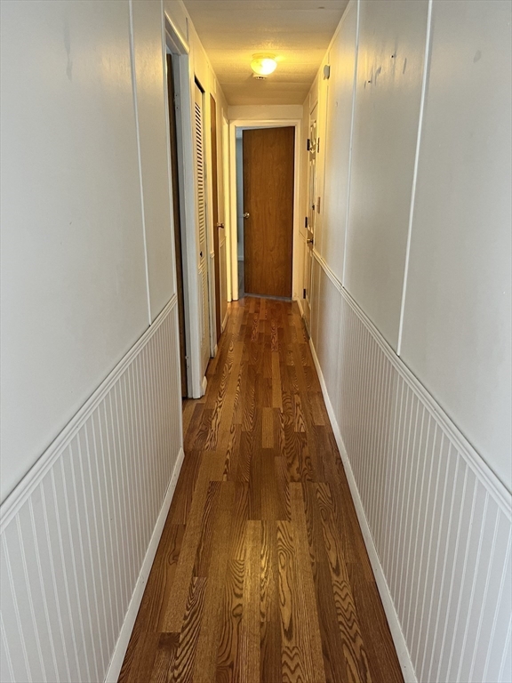 4 Joseph Street Wareham, MA 02538 - Photo 17 of 23 a view of a hallway with wooden floor