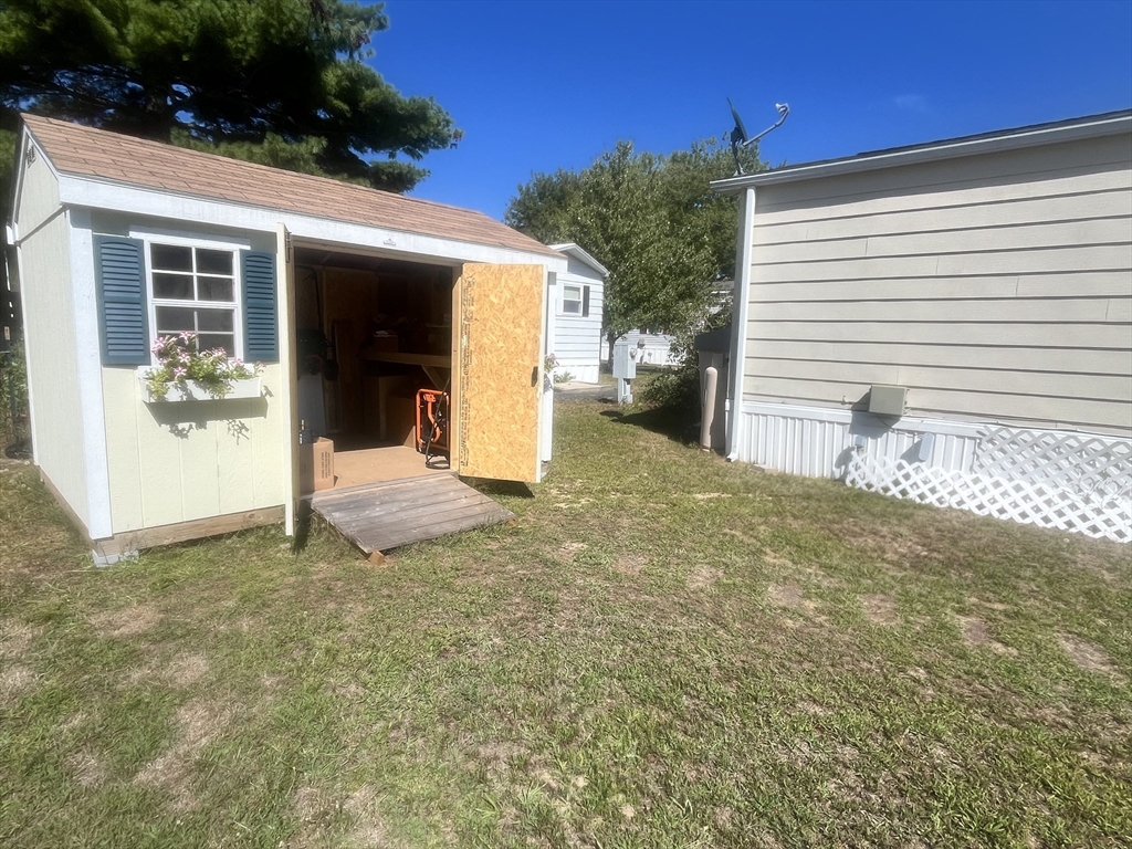 4 Joseph Street Wareham, MA 02538 - Photo 2 of 23 a view of a house with backyard and sitting area