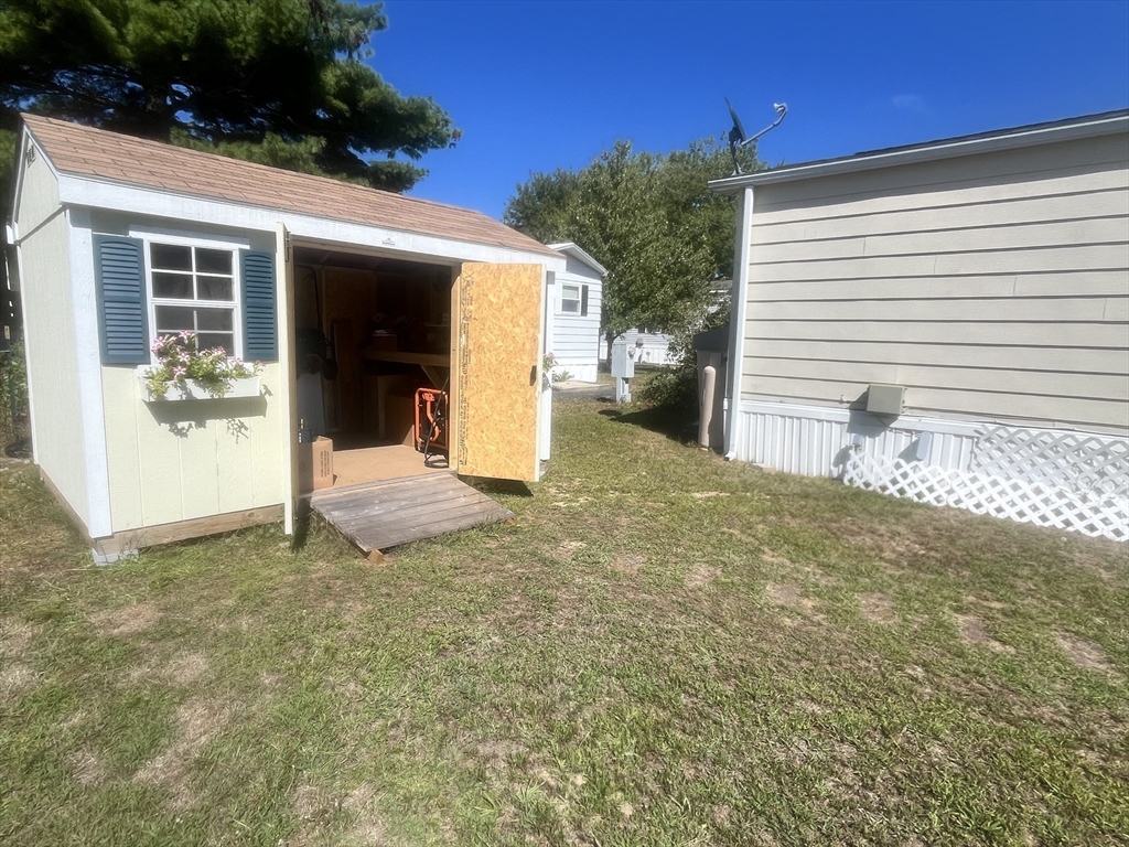 4 Joseph Street Wareham, MA 02538 - Photo 3 of 16 a view of a house with backyard and sitting area