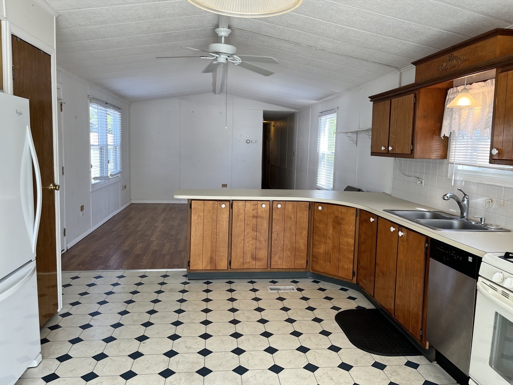 4 Joseph Street Wareham, MA 02538 - Photo 8 of 23 a bathroom with a sink a toilet a mirror and shower