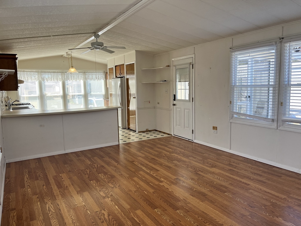 4 Joseph Street Wareham, MA 02538 - Photo 9 of 16 an empty room with wooden floor and windows