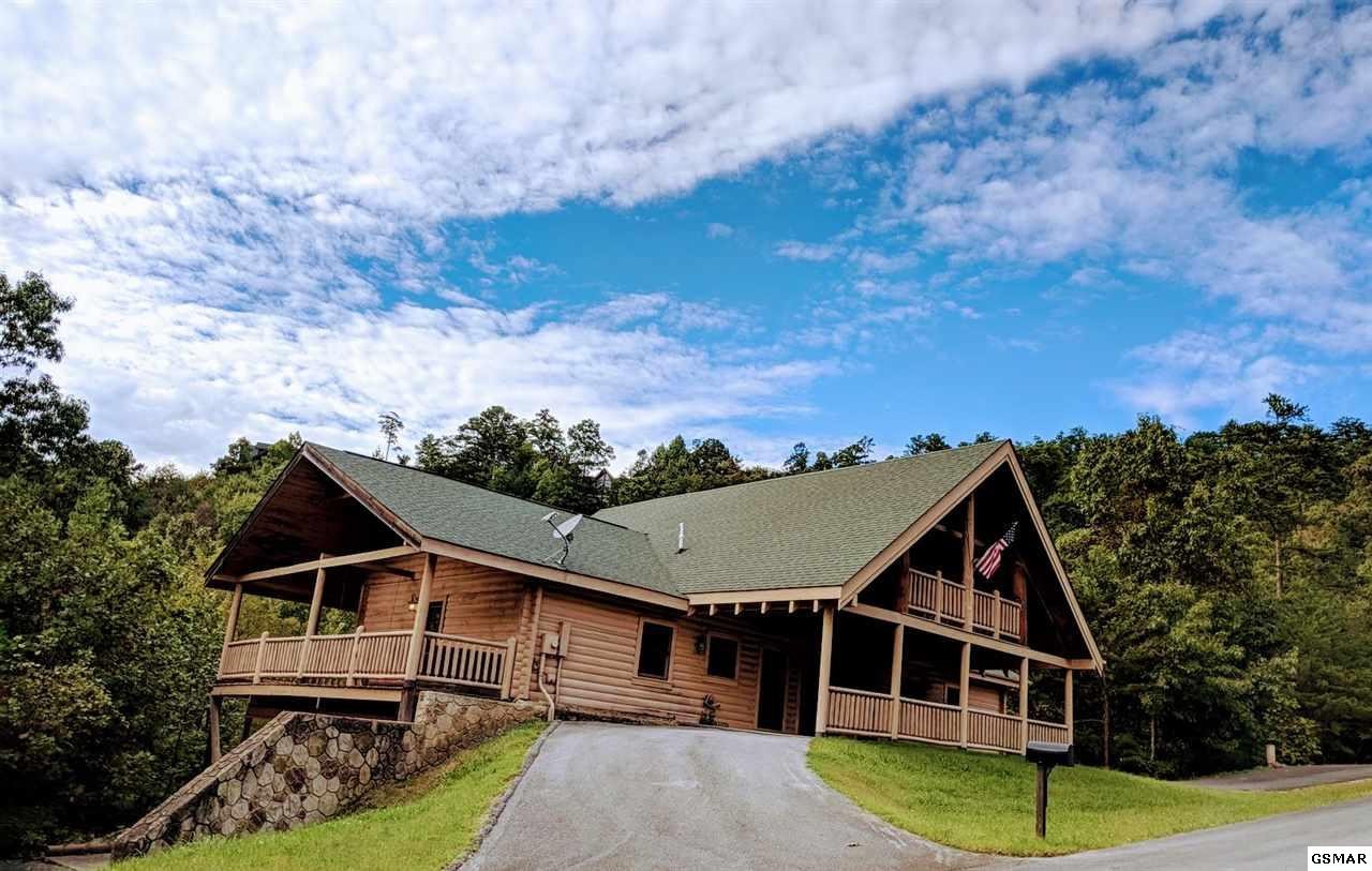 4409 Deerskin Road Sevierville, TN 37862 - Photo 26 of 31 a house view with a garden space
