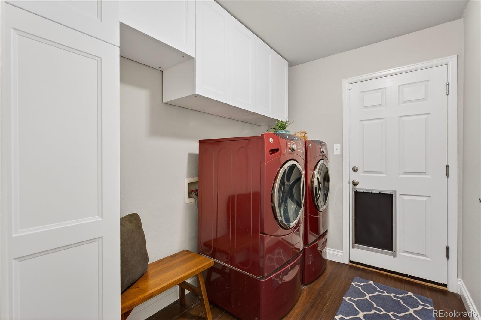 6737 Thistle Ridge Avenue Firestone, CO 80504 - Photo 23 of 39 a view of storage and utility room with washer and dryer