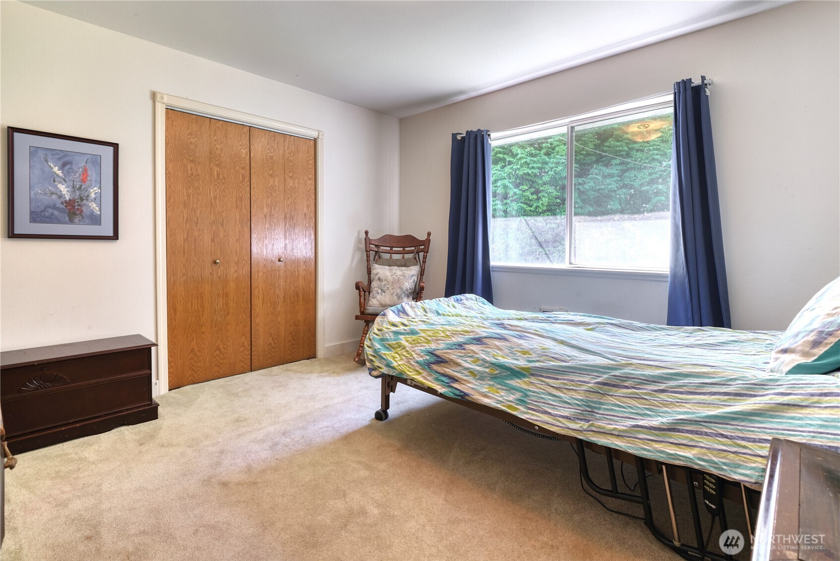 2145 Fir Street Point Roberts, WA 98281 - Photo 11 of 36 a bedroom with a bed and a dresser next to a window