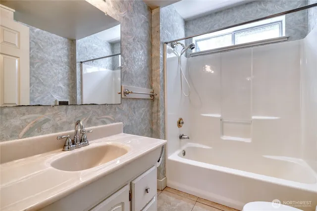 a bathroom with a sink and a bathtub