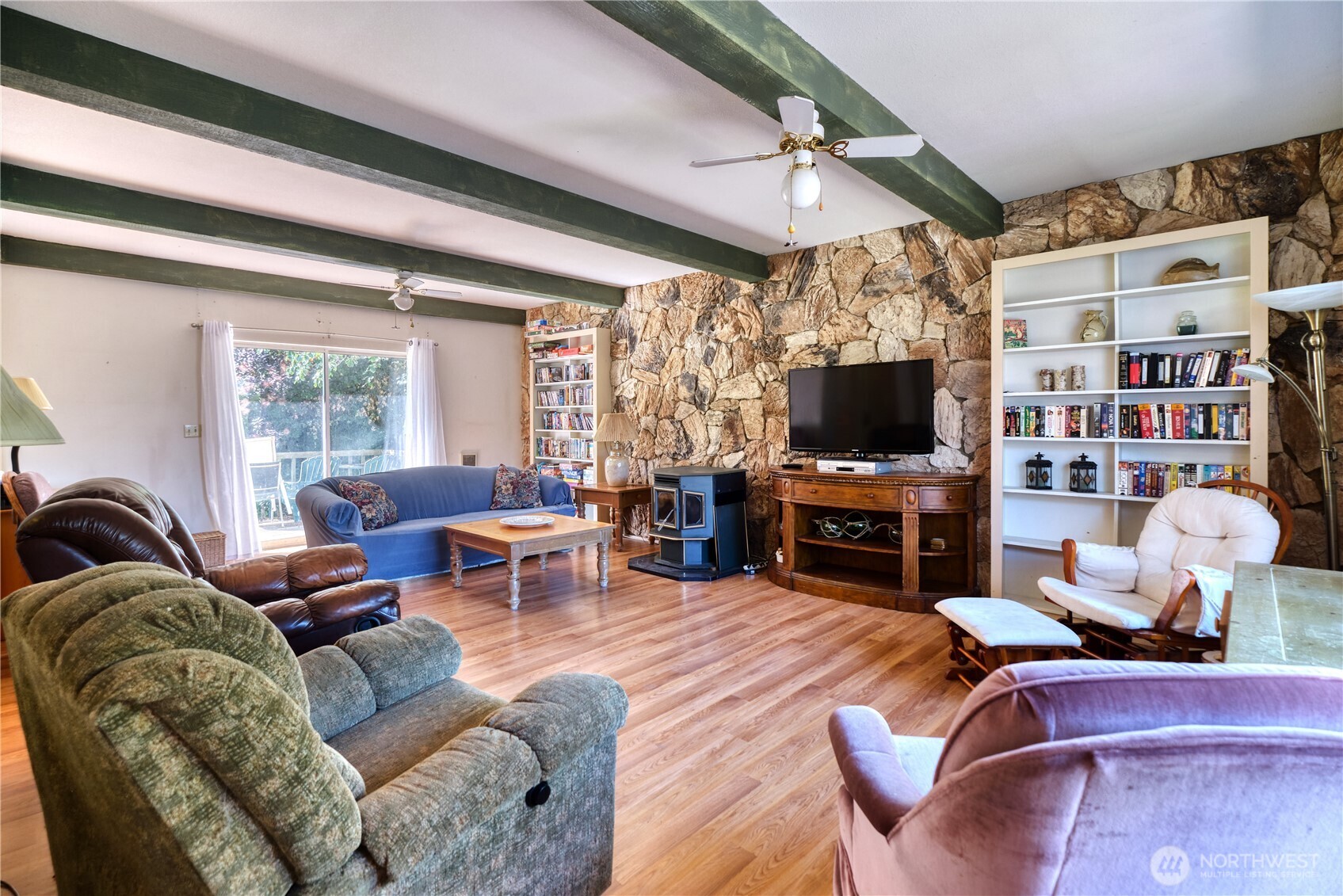 2145 Fir Street Point Roberts, WA 98281 - Photo 16 of 36 a living room with furniture and a flat screen tv