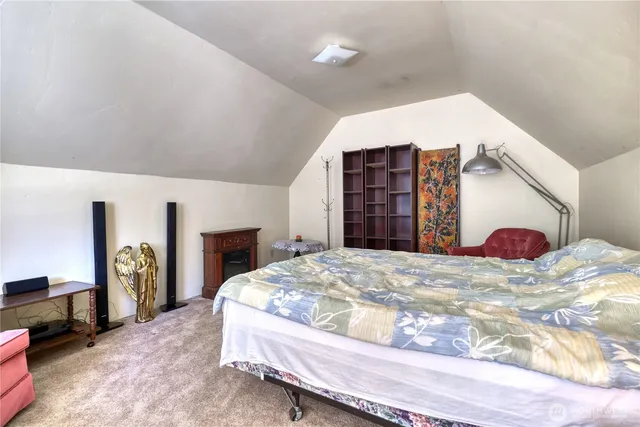 a bathroom with a sink toilet and mirror