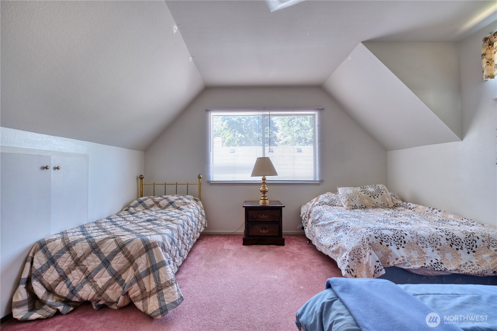 2145 Fir Street Point Roberts, WA 98281 - Photo 26 of 36 a bedroom with a bed and window